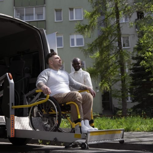 full-shot-disabled-man-getting-out-car